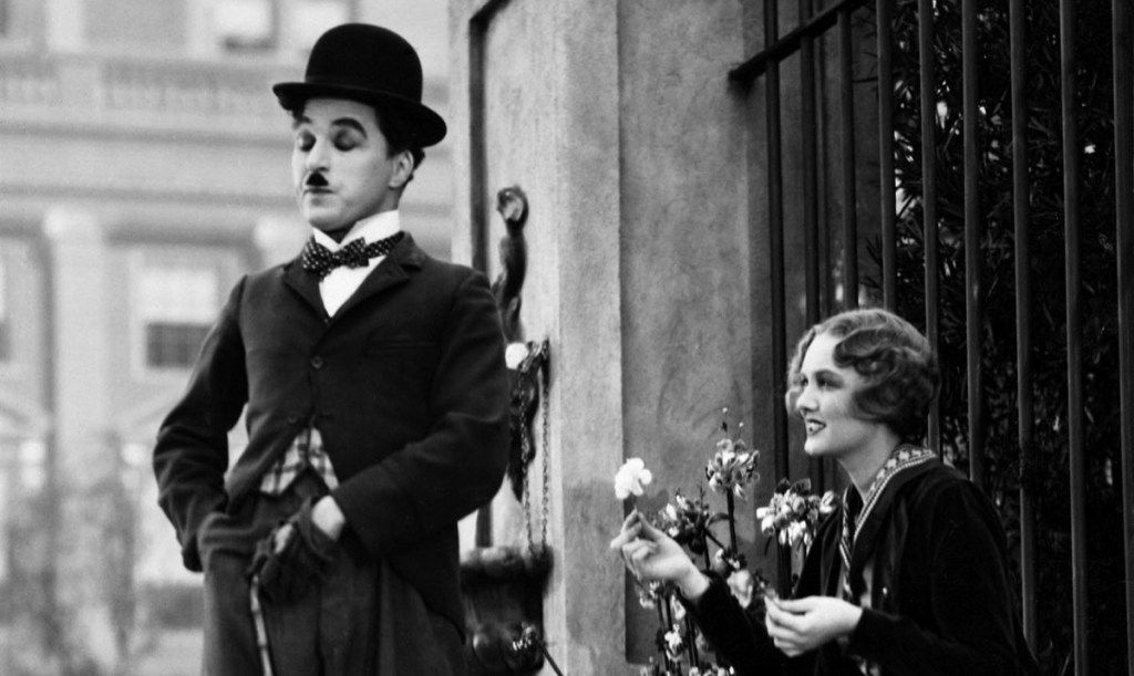 Charlesas Chaplinas ir Virginia Cherrill „Miesto šviesose“ (1931)