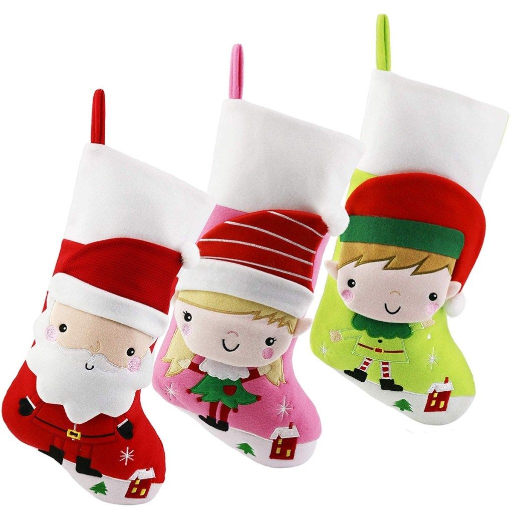 λευκές κάλτσες με santa και κινούμενα σχέδια ξωτικά πάνω τους