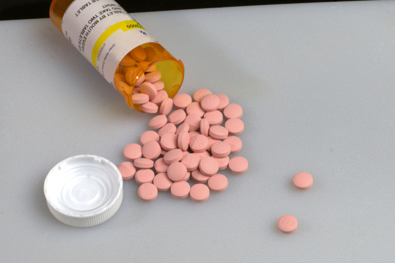   Frasco de prescripción derramado de pastillas de litio
