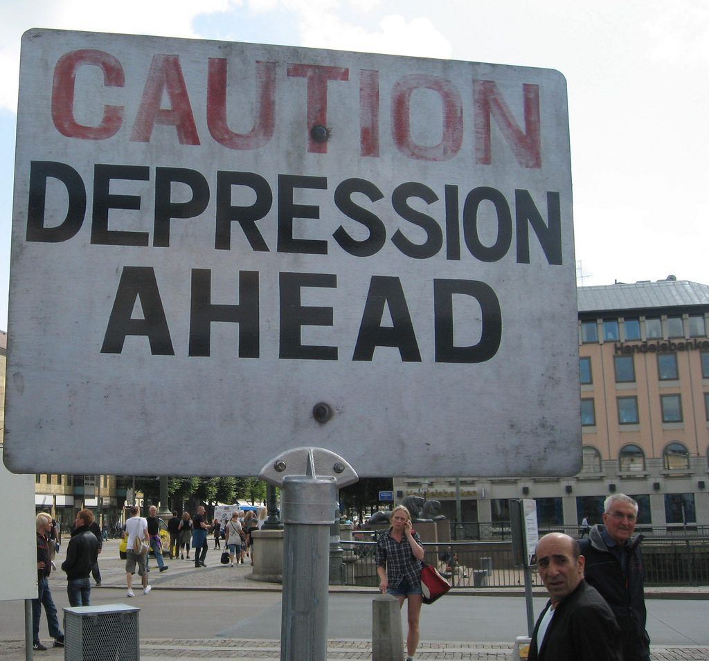 Depresija prieš įspėjamuosius kelio ženklus