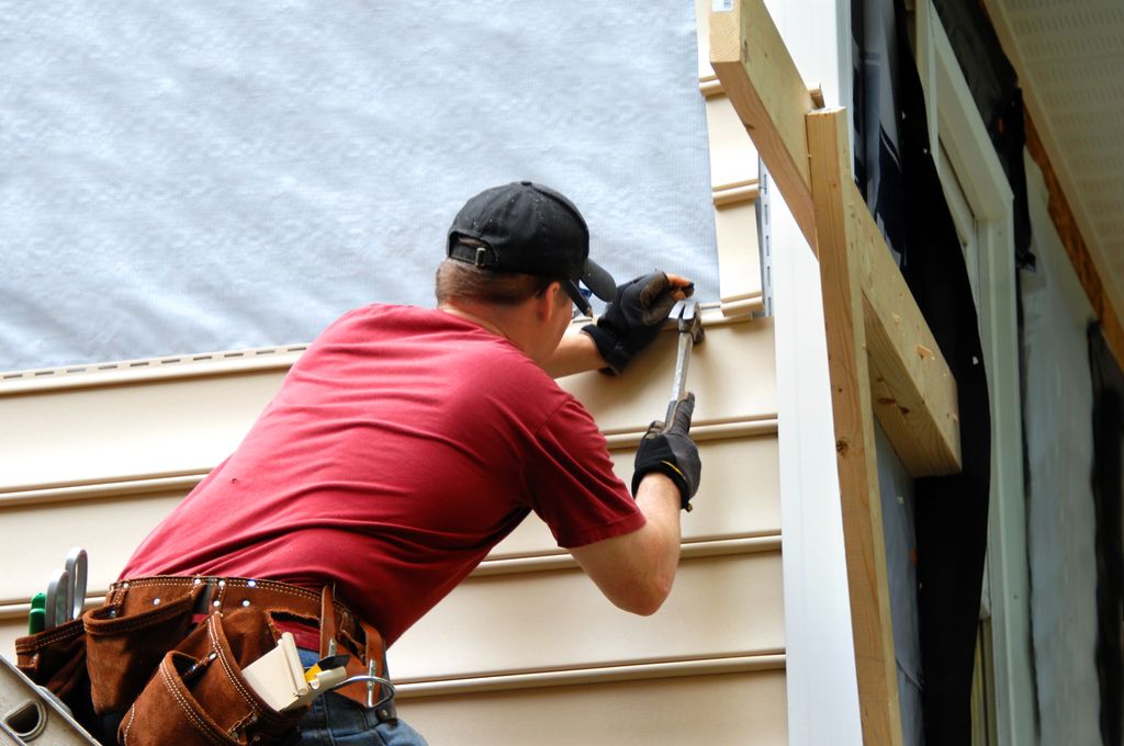 Man Installing Siding, Home-Upgrades
