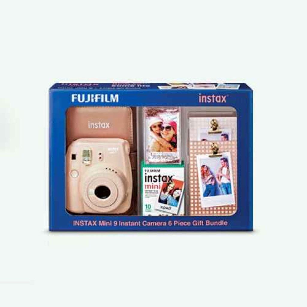 lyserød fujifilm instax kamera og film