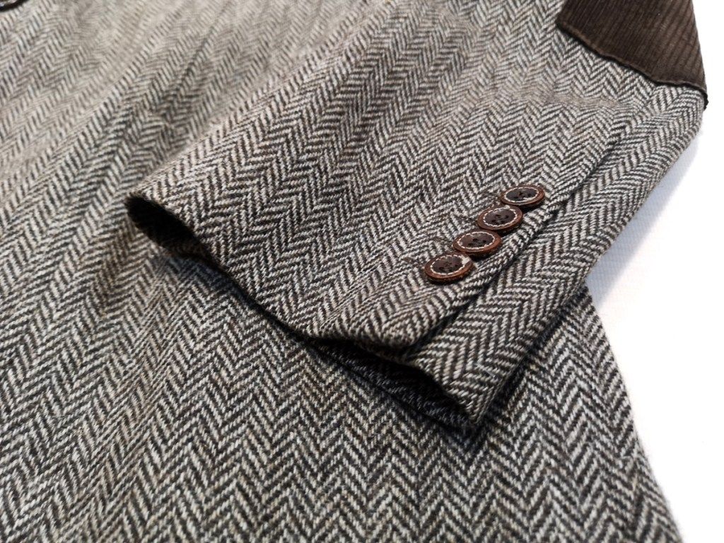 куртка, пиджак, светло-серая шерстяная или твидовая ткань для гранж-фона - Изображение
