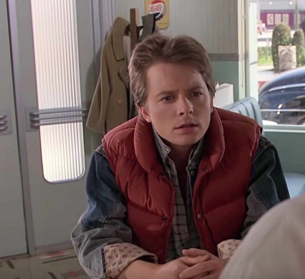 Regreso al futuro Michael J. Fox chaleco rojo estilo fresco de los años 80