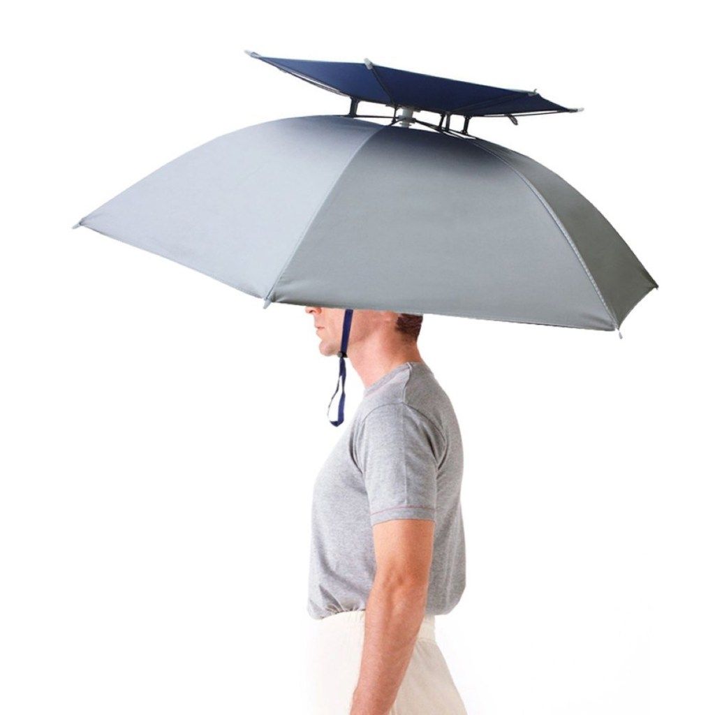 muž v klobouku deštník